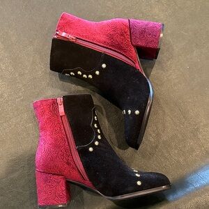 “Very Volatile” Black and Red Ankle Boots